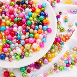 Boucles d’oreilles perles or blanc